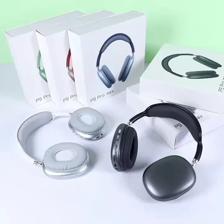 Two pairs of wireless over-ear headphones in white and black with P9 Pro Max boxes in background on white surface