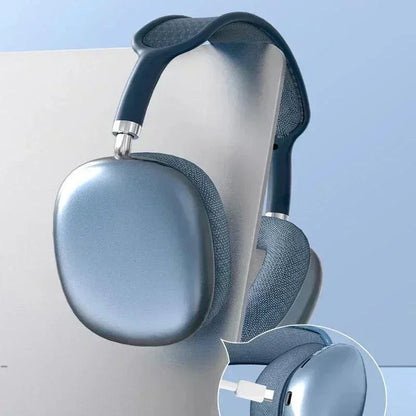 Blue wireless over-ear headphones with padded fabric ear cups and USB-C charging port, displayed on light background
